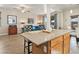 View of the kitchen island and dining area in an open concept home at 1124 Aspen Cliff Dr, Henderson, NV 89011