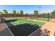 View of a community pickleball court fenced and ready for friendly matches and outdoor enjoyment at 1124 Aspen Cliff Dr, Henderson, NV 89011