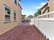 Property features a gated yard with desert landscaping, providing privacy and security at 1124 Aspen Cliff Dr, Henderson, NV 89011