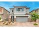 Charming two-story home with a two-car garage and stone accents at 1267 Dorado Sea Ct, Henderson, NV 89052