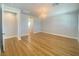 Bright, spacious bedroom with wood floors and a decorative chandelier at 138 Short Grass Ave, Las Vegas, NV 89148