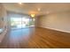 Sunlit living room with sliding doors leading to an outdoor patio at 138 Short Grass Ave, Las Vegas, NV 89148