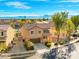 Aerial view of a lovely two-story home in a well-planned community near mountains and desert at 1813 Arch Stone Ave, North Las Vegas, NV 89031