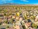 Neighborhood aerial view with mountain backdrop showcasing the home's location within a suburban community at 1813 Arch Stone Ave, North Las Vegas, NV 89031