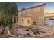 The backyard features a covered patio, ideal for outdoor enjoyment at 1813 Arch Stone Ave, North Las Vegas, NV 89031