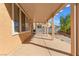 Backyard patio with a full-length covered structure, and a grill at 1813 Arch Stone Ave, North Las Vegas, NV 89031