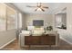 Bright living room featuring neutral colors, modern furniture, stylish decor, and plenty of natural light at 1813 Arch Stone Ave, North Las Vegas, NV 89031