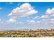 Panoramic city view overlooking rooftops and cityscape with blue sky and clouds at 1964 Oliver Springs St, Henderson, NV 89052