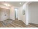 Bright foyer featuring hard surface floors, neutral paint, and an open doorway at 1964 Oliver Springs St, Henderson, NV 89052