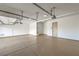 Spacious three car garage with epoxy floors and custom lighting at 1964 Oliver Springs St, Henderson, NV 89052