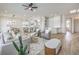 A bright and airy living room area showcases an open-concept layout and stylish neutral-toned decor at 1964 Oliver Springs St, Henderson, NV 89052
