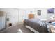 Well lit bedroom with a sliding door closet, light grey carpet and earth tone accents at 204 N Ring Dove Dr, Las Vegas, NV 89144