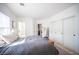 Bedroom featuring a large bed, closet and plenty of light at 204 N Ring Dove Dr, Las Vegas, NV 89144