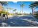 Talon Pointe gated community entrance and lush palm trees at 204 N Ring Dove Dr, Las Vegas, NV 89144