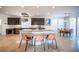 Spacious kitchen with a large island, dark cabinets, and modern appliances at 204 N Ring Dove Dr, Las Vegas, NV 89144