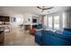 Spacious living room with fireplace, comfortable seating, and access to outdoor area at 204 N Ring Dove Dr, Las Vegas, NV 89144