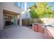 Backyard patio area featuring a built-in barbecue, outdoor kitchen, and relaxing space at 204 N Ring Dove Dr, Las Vegas, NV 89144
