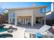 Outdoor patio area with covered space, pool access, and elegant furnishings, perfect for entertaining at 204 N Ring Dove Dr, Las Vegas, NV 89144