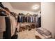 Spacious walk-in closet with ample hanging and shelving space for organized storage of clothing and accessories at 204 N Ring Dove Dr, Las Vegas, NV 89144