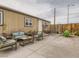 Spacious backyard patio featuring stylish outdoor seating, perfect for relaxation and entertaining guests at 2060 Toiyabe St, Las Vegas, NV 89156