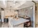 Kitchen boasts stainless steel appliances, a stylish ceiling fan, and ample natural light at 2060 Toiyabe St, Las Vegas, NV 89156