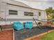 A cozy outdoor space featuring a recreational vehicle with comfy seating and a hammock at 2060 Toiyabe St, Las Vegas, NV 89156