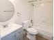 Bathroom view showcases shower/tub combo, vanity with round mirror, and toilet at 2191 Bay Club Dr # 102, Laughlin, NV 89029