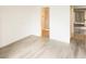 Spacious bedroom with light wood-look flooring and neutral paint at 2191 Bay Club Dr # 102, Laughlin, NV 89029