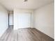 Bedroom includes large closet; light wood-look flooring throughout at 2191 Bay Club Dr # 102, Laughlin, NV 89029