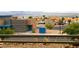 Elevated exterior view of a building, parking lot, and desert landscape at 2191 Bay Club Dr # 102, Laughlin, NV 89029
