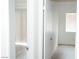 View from hallway to room with window; bright, neutral color palette at 2191 Bay Club Dr # 102, Laughlin, NV 89029