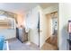 Bright bedroom with a large window, closet access, and neutral decor, creating a serene and inviting space at 2261 Tall Pine Dr, Las Vegas, NV 89108