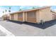 Street view of home, showing garage access and community street at 2261 Tall Pine Dr, Las Vegas, NV 89108