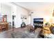 Bright living room with vaulted ceilings, hardwood floors, and comfortable seating at 2261 Tall Pine Dr, Las Vegas, NV 89108