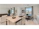 Open floorplan features a large living room open to the kitchen and dining area with lots of natural light at 240 White Crest Peak Ave, Henderson, NV 89015