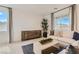 Spacious living area with ample natural light, comfortable seating, and stylish decor at 240 White Crest Peak Ave, Henderson, NV 89015