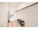 Convenient laundry area complete with a stackable washer/dryer unit and storage space at 242 White Crest Peak Ave, Henderson, NV 89015