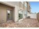 This brick paver patio features a sliding glass door, a door, AC unit and a partial view of mountains at 242 White Crest Peak Ave, Henderson, NV 89015