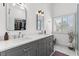 Modern bathroom featuring double sinks, ample storage, and stylish fixtures at 2513 Aberdeen Ln, Henderson, NV 89014