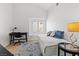 Bright bedroom with a desk, a daybed, and a cozy rug at 2513 Aberdeen Ln, Henderson, NV 89014