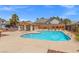 Inviting community pool with lounge chairs and shaded seating available for residents at 2513 Aberdeen Ln, Henderson, NV 89014