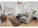 Cozy living room featuring hardwood floors, abundant natural light, and chic contemporary decor at 2513 Aberdeen Ln, Henderson, NV 89014