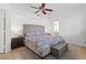 Bright main bedroom with king bed, ceiling fan, and neutral décor at 2513 Aberdeen Ln, Henderson, NV 89014
