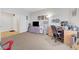 Spacious bedroom with carpet flooring, a desk, and a window providing natural light at 2613 Velodrome Ct, Henderson, NV 89044
