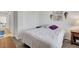 Cozy bedroom featuring a closet, decorative lamps, and comfortable bed setting at 2613 Velodrome Ct, Henderson, NV 89044