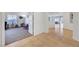 Hallway features tile floors, light-colored walls, and access to a room filled with instruments at 2613 Velodrome Ct, Henderson, NV 89044