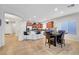 Bright kitchen with an island bar and access to the dining area for casual and formal meals at 2613 Velodrome Ct, Henderson, NV 89044