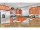 Gourmet kitchen featuring stainless steel appliances, granite countertops, and ample cabinet space at 2613 Velodrome Ct, Henderson, NV 89044