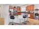 Kitchen with an island bar, stainless steel appliances, and stylish cabinetry at 2613 Velodrome Ct, Henderson, NV 89044