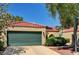 Charming single-story home featuring a two-car garage, a tile roof, and desert landscaping at 2832 Cape Hope Way, Las Vegas, NV 89121